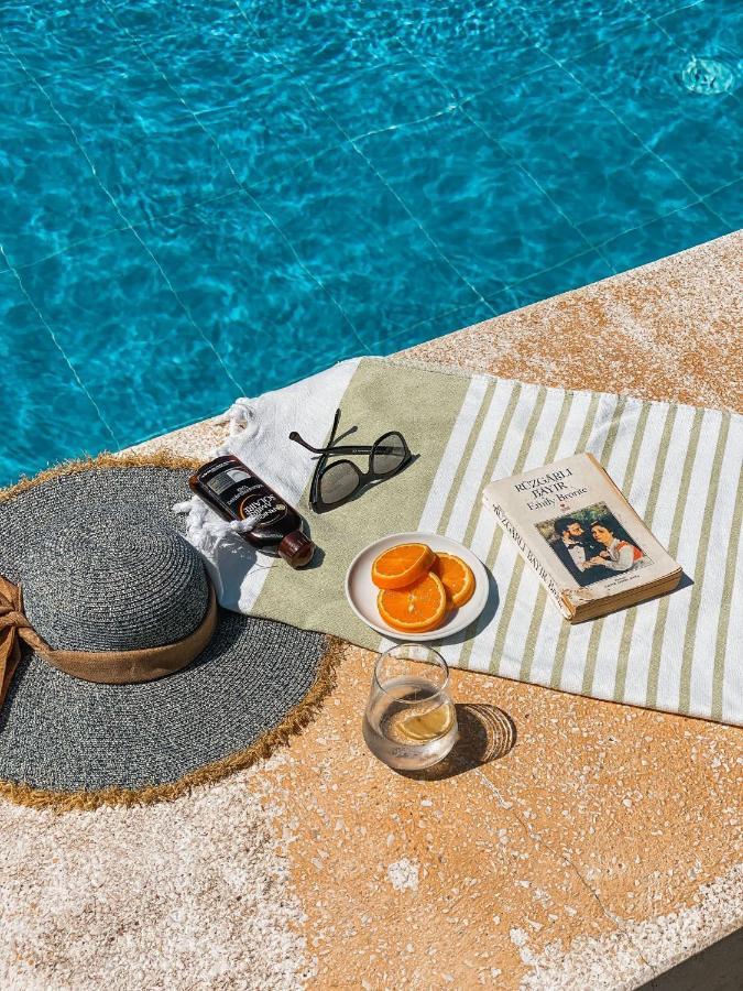 Ilcayto Suites Foça Bagian luar foto