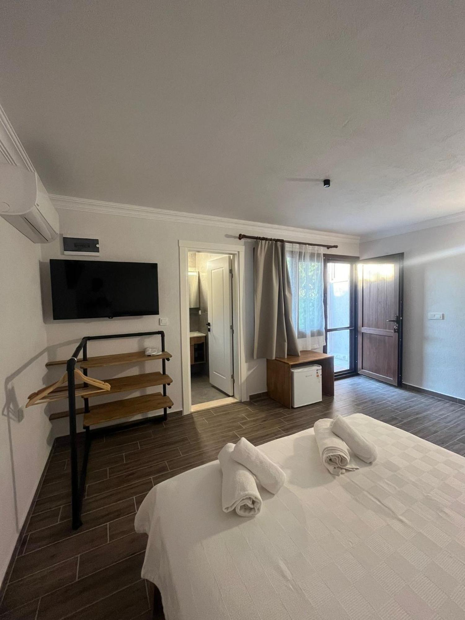 Ilcayto Suites Foça Bagian luar foto